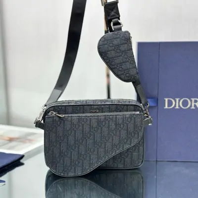 Grey shoulder bag shown in a product listing
