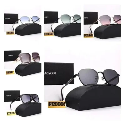 Six pairs of sunglasses with their cases, arranged in two rows